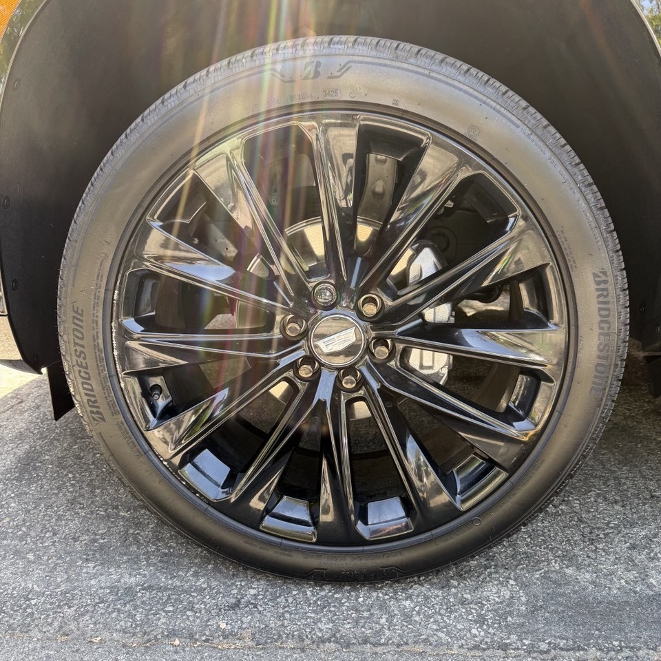 Cadillac wheel before repair