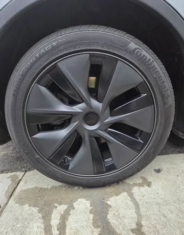 Tesla rim before repair